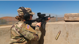 U.S. Service member fires weapon at drone